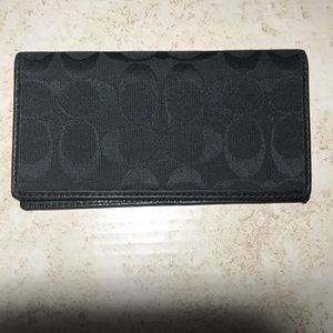Coach check book cover